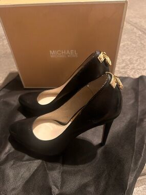 BCBG Black Leather Pointed Toe Stiletto Pumps with Gold Heel Accent